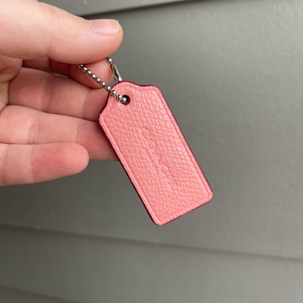 Pink Leather Coach hang tag w/dark red trim